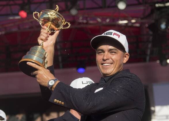 USA team member Rickie Fowler celebrates with the Ryder Cup after the United States defeated Europe 17-11 to win the 2016 Ryder Cup at Hazeltine National Golf Club in Chaska, Minnesota on October 2, 2016. USA defeated Europe for the first time since 2008.  MIN20161002336 KEVINxDIETSCH
