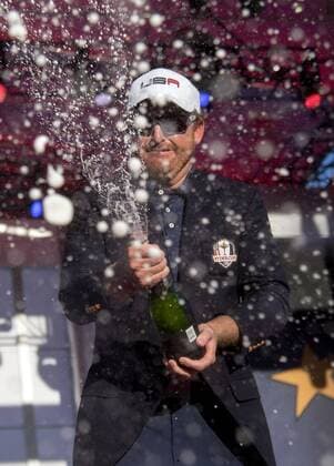 Golf, Ryder Cup 2016 in Chaska USA team member J.B. Holmes celebrates after the United States defeated Europe 17-11 to win the 2016 Ryder Cup at Hazeltine National Golf Club in Chaska, Minnesota on October 2, 2016. USA defeated Europe for the first time since 2008.  MIN20161002339 KEVINxDIETSCH