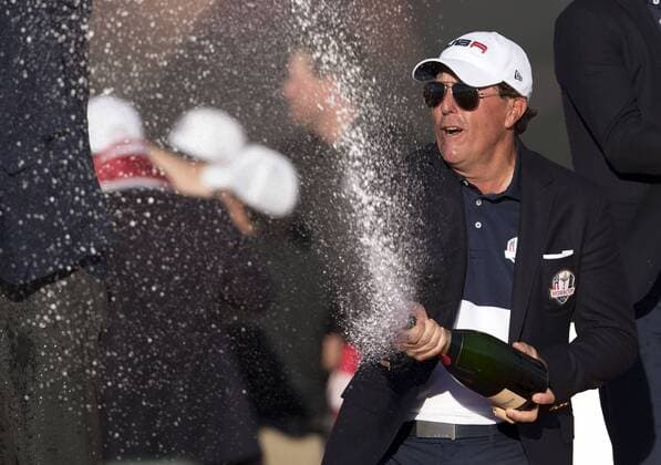 USA team member Phil Mickelson celebrates after the United States defeated Europe 17-11 to win the 2016 Ryder Cup at Hazeltine National Golf Club in Chaska, Minnesota on October 2, 2016. USA defeated Europe for the first time since 2008.  MIN20161002347 KEVINxDIETSCH
