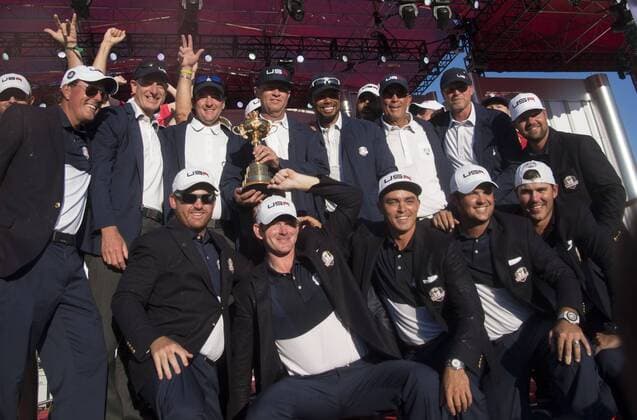 The USA team poses after defeating Europe 17-11 to win the 2016 Ryder Cup at Hazeltine National Golf Club in Chaska, Minnesota on October 2, 2016. USA defeated Europe for the first time since 2008.  MIN20161002354 KEVINxDIETSCH