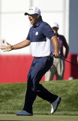 USA team member Patrick Reed celebrates after winning his match during the final round of the 2016 Ryder Cup at Hazeltine National Golf Club in Chaska, Minnesota on October 2, 2016. USA defeated Europe 17-11 winning the Ryder Cup for the first time since 2008.  MIN20161002361 KEVINxDIETSCH