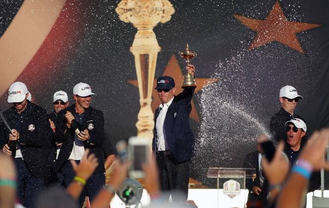 October 2, 2016 - Chaska, MN, USA - U.S. Ryder Cup captain Davis Love III holds up the cup under a champaigne bath on Sunday, Oct. 2, 2016 at the conclusion of 2016 Ryder Cup at the Hazeltine National Golf Club in Chaska, Minn. Ryder Cup staying as United States closes out Europe; first victory since 2008 - ZUMAm67_