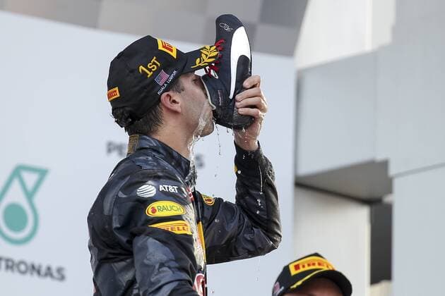 02 October 2016: Daniel Ricciardo of Red Bull Racing celebrate on the podium after winning the race of the Formula 1 Petronas Malaysia Grand Prix held at Sepang International Circuit in Sepang, Malaysia.(Photo by Hazrin Yeob Men Shah Icon Sportswire) AUTO: OCT 02 Formula 1 - Malaysia Grand Prix Icon3781610028079 EDITORIAL USE ONLY