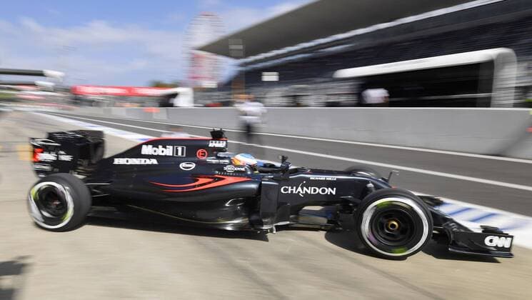 motor racing Motorsport Scenes from Day 1 of Japanese Grand Prix McLaren-Honda driver Fernando Alonso takes off from the pit on the opening day of the Formula One Japanese Grand Prix at the Suzuka Circuit in Suzuka, central Japan, on Oct. 7, 2016. 