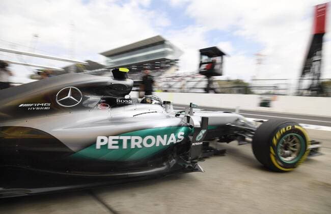motor racing Motorsport Scenes from Day 1 of Japanese Grand Prix Mercedes driver Nico Rosberg takes off from the pit on the opening day of the Formula One Japanese Grand Prix at the Suzuka Circuit in Suzuka, central Japan, on Oct. 7, 2016. 