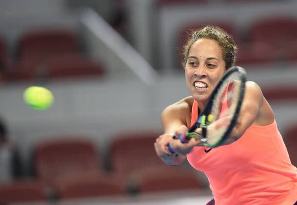 (161007) -- BEIJING, Oct. 7, 2016 -- Madison Keys of the United States hits a return to Petra Kvitova of the Czech Republic during their women s singles quarterfinal match at the China Open tennis tournament in Beijing, capital of China, Oct. 7, 2016. Madison Keys won by 2-1. ) (SP)CHINA-BEIJING-TENNIS-CHINA OPEN (CN) LixWen 