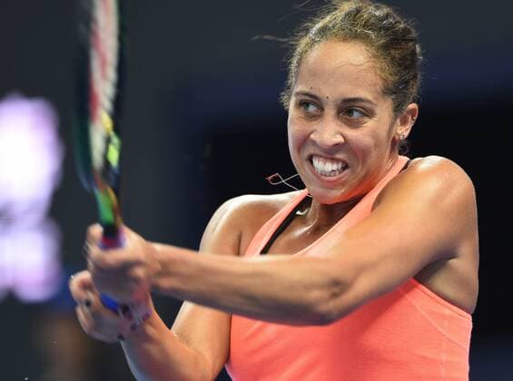 (161007) -- BEIJING, Oct. 7, 2016 -- Madison Keys of the United States hits a return to Petra Kvitova of the Czech Republic during their women s singles quarterfinal match at the China Open tennis tournament in Beijing, capital of China, Oct. 7, 2016. Madison Keys won by 2-1. ) (SP)CHINA-BEIJING-TENNIS-CHINA OPEN (CN) LixWen 