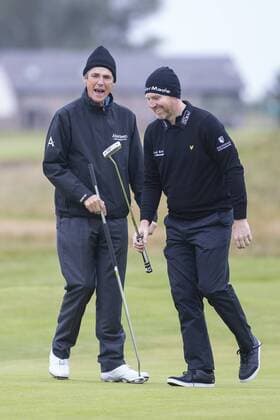 07.10.2016. Carnoustie Golf Course, Fife, Scotland. Alfred Dunhill Links Championship Golf 2nd Round. Alan Hansen chatting to Stephen Gallacher on the 11th Green xDuncanxMcGlynnx  ActionPlus11797437