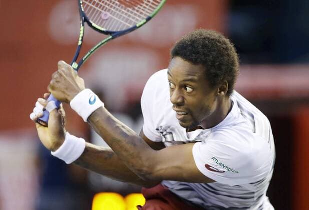 Tennis: Monfils moves into semifinals in Tokyo Gael Monfils of France hits a backhand to Ivo Karlovic of Croatia in the quarterfinals of the Japan Open at Ariake Tennis Forest Park in Tokyo on Oct. 7, 2016. Monfils won 7-6(6), 7-6(6). 