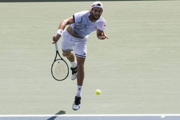 October 7, 2016 - Tokyo, Tokyo, Japan - Joao Sousa (POR) returns a shot against David Goffin (BEL) in their men s singles quarterfinal match during the japan Open tennis at the Ariake Coliseum, Tokyo. David Goffin defeated Joao Sousa with a 2-1 World News - October 7, 2016 - ZUMAc166