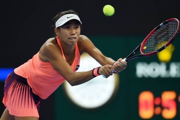(161007) -- BEIJING, Oct. 7, 2016 -- Zhang Shuai of China hits a return to Johanna Konta of Britain during their women s singles quarterfinal match at the China Open tennis tournament in Beijing, capital of China, Oct. 7, 2016. Johanna Konta won by 2-0. ) (SP)CHINA-BEIJING-TENNIS-CHINA OPEN (CN) JuxHuanzong 