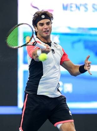 BEIJING, CHINA - OCTOBER 07: Malek Jaziri of Tunisia returns a shot against Milos Raonic of Canana during the Men s singles second round match on day seven of the 2016 China Open at the China National Tennis Centre on October 7, 2016 in Beijing, China.  CFP493436562 