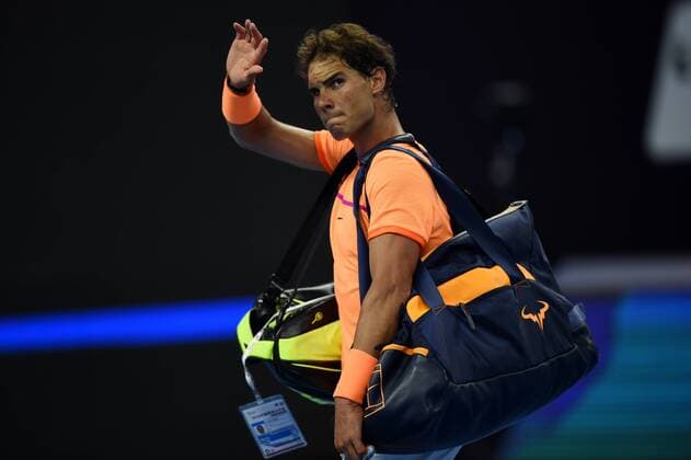 (161007) -- BEIJING, Oct. 7, 2016 -- Rafael Nadal of Spain reacts after losing his men s singles quarterfinal match against Grigor Dimitrov of Bulgaria at the China Open tennis tournament in Beijing, capital of China, Oct. 7, 2016. Grigor Dimitrov won by 2-0. ) (SP)CHINA-BEIJING-TENNIS-CHINA OPEN (CN) JuxHuanzong 