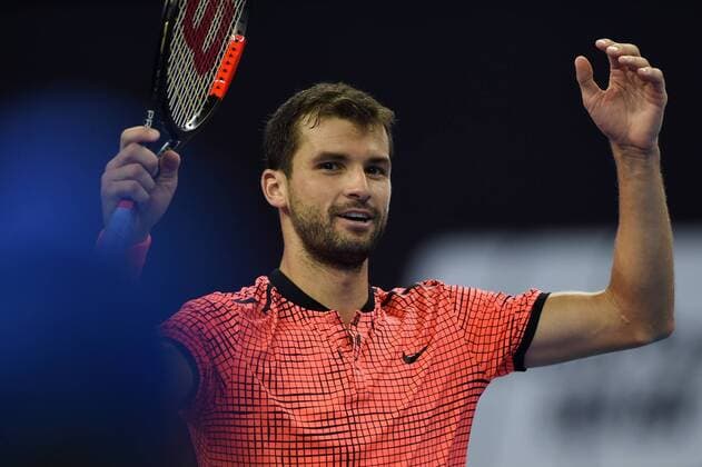 (161007) -- BEIJING, Oct. 7, 2016 -- Grigor Dimitrov of Bulgaria reacts after winning his men s singles quarterfinal match against Rafael Nadal of Spain at the China Open tennis tournament in Beijing, capital of China, Oct. 7, 2016. Grigor Dimitrov won by 2-0. ) (SP)CHINA-BEIJING-TENNIS-CHINA OPEN (CN) JuxHuanzong 
