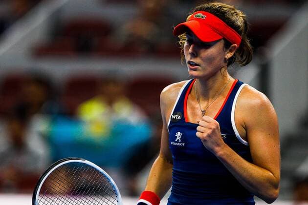 BEIJING, CHINA - OCTOBER 07: Alize Cornet of France celebrates a point against Yaroslava Shvedova of Kazakhstan during the Women s singles third round match on day seven of the 2016 China Open at the China National Tennis Centre on October 7, 2016 in Beijing, China.  CFP493438569 