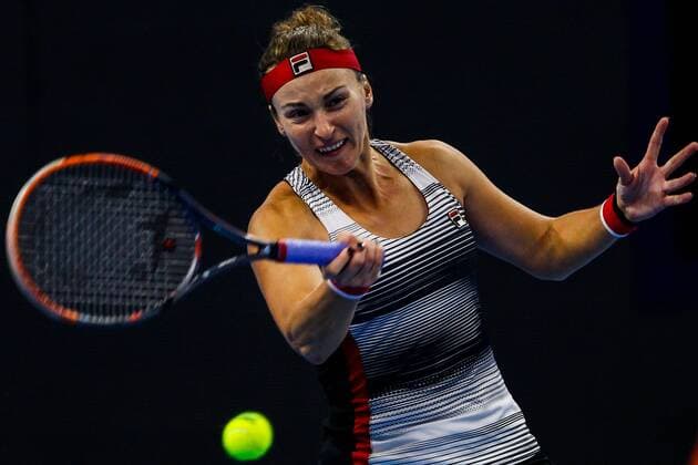 BEIJING, CHINA - OCTOBER 07: Yaroslava Shvedova of Kazakhstan returns a shot against Alize Cornet of France during the Women s singles third round match on day seven of the 2016 China Open at the China National Tennis Centre on October 7, 2016 in Beijing, China.  CFP493438570 