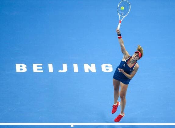 BEIJING, CHINA - OCTOBER 07: Alize Cornet of France serves the ball against Yaroslava Shvedova of Kazakhstan during the Women s singles third round match on day seven of the 2016 China Open at the China National Tennis Centre on October 7, 2016 in Beijing, China.  CFP493438576 