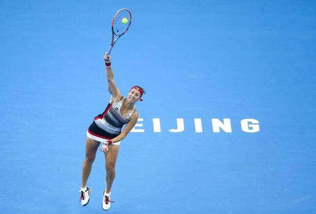 BEIJING, CHINA - OCTOBER 07: Yaroslava Shvedova of Kazakhstan returns a shot against Alize Cornet of France during the Women s singles third round match on day seven of the 2016 China Open at the China National Tennis Centre on October 7, 2016 in Beijing, China.  CFP493438580 