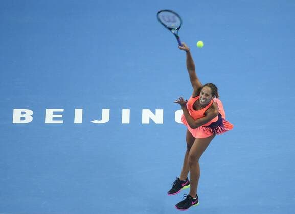 BEIJING, CHINA - OCTOBER 07: Madison Keys of U.S.A returns a shot against Petra Kvitova of the Czech Republic during the Women s singles quarterfinals match on day seven of the 2016 China Open at the China National Tennis Centre on October 7, 2016 in Beijing, China.  CFP493443718 