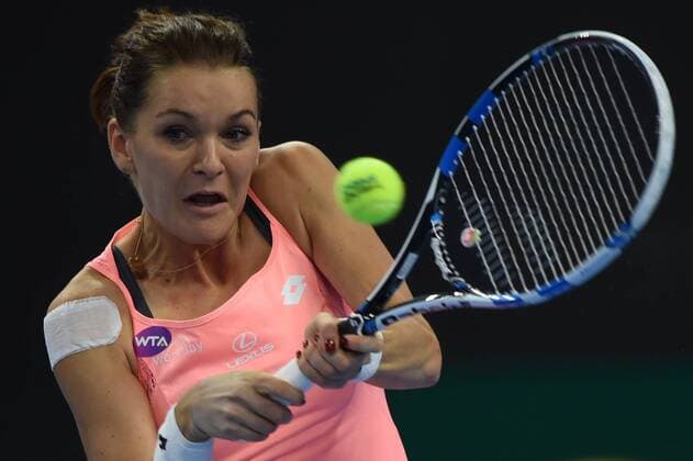 (161008) -- BEIJING, Oct. 7, 2016 -- Agnieszka Radwanska of Poland returns a shot during her women s singles quarterfinal match against Yaroslava Shvedova of Kazakhstan at the China Open tennis tournament in Beijing, capital of China, Oct. 7, 2016. Agnieszka Radwanska won 2-0. ) (SP)CHINA-BEIJING-TENNIS-CHINA OPEN (CN) JuxHuanzong 
