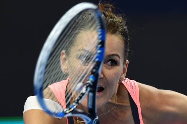 (161008) -- BEIJING, Oct. 7, 2016 -- Agnieszka Radwanska of Poland returns a shot during her women s singles quarterfinal match against Yaroslava Shvedova of Kazakhstan at the China Open tennis tournament in Beijing, capital of China, Oct. 7, 2016. Agnieszka Radwanska won 2-0. ) (SP)CHINA-BEIJING-TENNIS-CHINA OPEN (CN) JuxHuanzong 