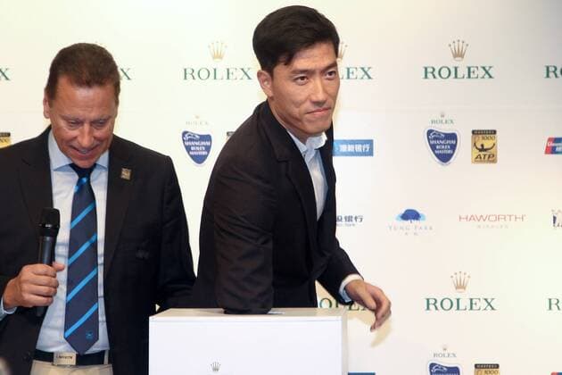 Retired Chinese hurdling star Liu Xiang, right, attends the main draw ceremony for the 2016 Shanghai Rolex Masters tennis tournament in Shanghai, China, 8 October 2016. Sports stars highlight main draw ceremony for 2016 Shanghai Rolex Masters  pbu514644_05