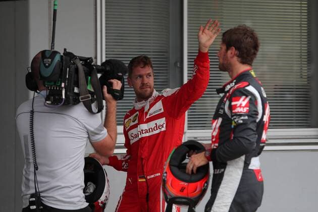 Japanese Grand Prix, Suzuka 6 - 9 October 2016 08.10.2016 - Qualifying, Sebastian Vettel (GER) Scuderia Ferrari SF16-H and Romain Grosjean (FRA) Haas F1 Team VF-16 