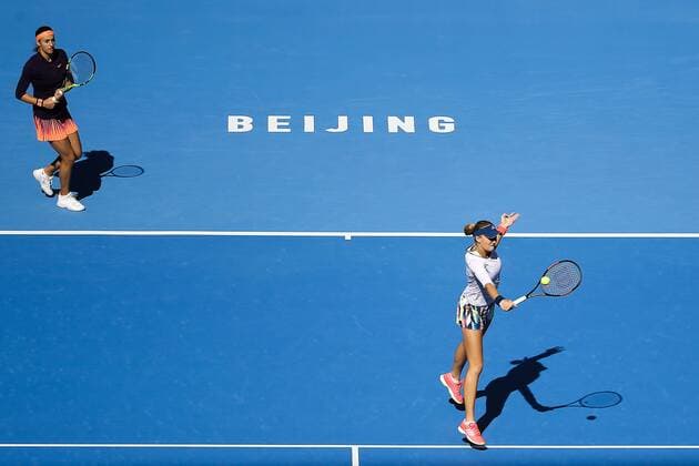 BEIJING, CHINA - OCTOBER 08: Caroline Garcia and Kristina Mladenovic of France in action during the Women s doubles semifinals against Hao-Ching Chan and Yung-Jan Chan of Chinese Taipei on day eight of the 2016 China Open at the China National Tennis Centre on October 8, 2016 in Beijing, China.  CFP493487118 