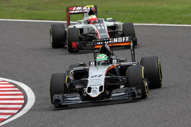 Japanese Grand Prix, Suzuka 6 - 9 October 2016 09.10.2016 - Race, Nico Hulkenberg (GER) Sahara Force India F1 VJM09 leads Esteban Gutierrez (MEX) Haas F1 Team VF-16 