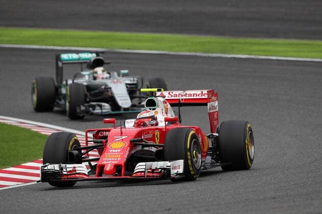 Japanese Grand Prix, Suzuka 6 - 9 October 2016 09.10.2016 - Race, Kimi Raikkonen (FIN) Scuderia Ferrari SF16-H leads Lewis Hamilton (GBR) Mercedes AMG F1 W07 Hybrid 
