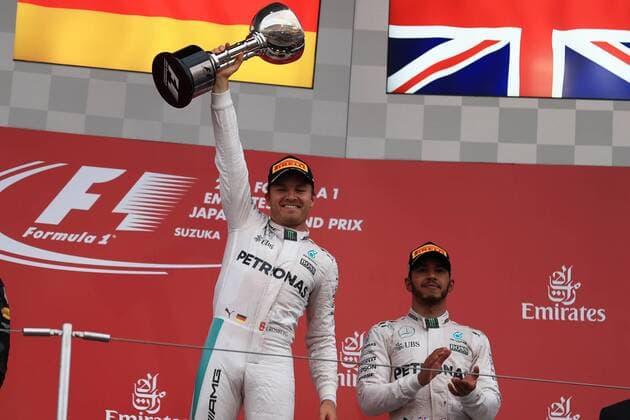 08.10.2016. Suzuka Circuit, Suzuka City, Mie Prefecture, Japan. Formula 1 Grand Prix of Japan Race Day. Mercedes AMG Petronas - Nico Rosberg holds up his trophy as he wins at Suzuka in front of Lewis Hamilton xLeannexBoonx  ActionPlus11798380