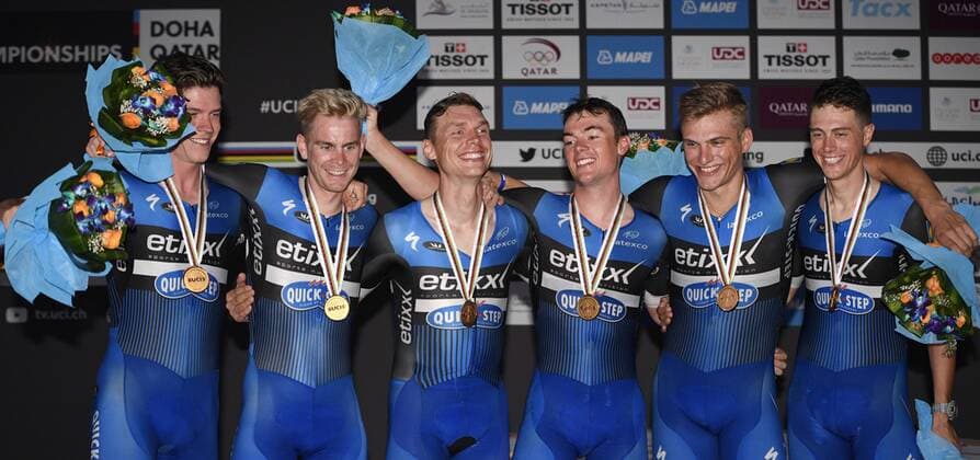 Luxembourgian Bob Jungels of team Etixx - Quick-Step, Belgian Julien Vermote of team Etixx - Quick-Step, German Tony Martin of team Etixx - Quick-Step, Belgian Yves Lampaert of team Etixx - Quick-Step, German Marcel Kittel of team Etixx - Quick-Step and Dutch Niki Terpstra of team Etixx - Quick-Step celebrate on the podium after winning the men s team time trial at the 2016 UCI World Road World Cycling Championships in Doha, Qatar, Sunday 09 October 2016. YORICKxJANSENS  x04950305x