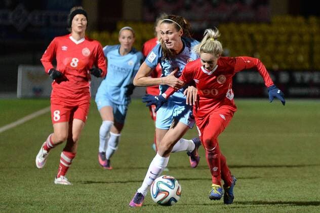 PERM, RUSSIA â€“ OCTOBER 12, 2016: Manchester City s Jill Scott and Zvezda 2005 Perm s Anastasia Akimova (L-R front) fight for the ball in the second leg of their 2016 17 Season UEFA Women s Champions League Round of 32 football match at Zvezda Stadium. FC Manchester City won the game 4-0. Donat Sorokin TASS  TS0344C4