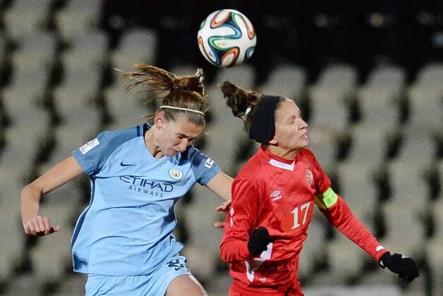 PERM, RUSSIA â€“ OCTOBER 12, 2016: Manchester City s Jill Scott (L) and Zvezda 2005 Perm s Darya Apanashchenko jump to head the ball in the second leg of their 2016 17 Season UEFA Women s Champions League Round of 32 football match at Zvezda Stadium. FC Manchester City won the game 4-0. Donat Sorokin TASS  TS0344CD