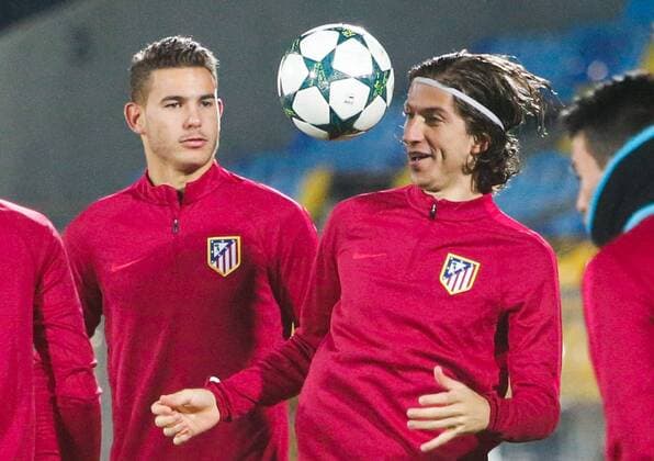 ROSTOV-ON-DON, RUSSIA - OCTOBER 18, 2016: FC Atletico Madrid s defenders Lucas Hernandez (L) and Filipe Luis training for the upcoming 2016 17 Season UEFA Champions League Group D Round 3 football match against FC Rostov. Valery Matytsin TASS  TS034D7C