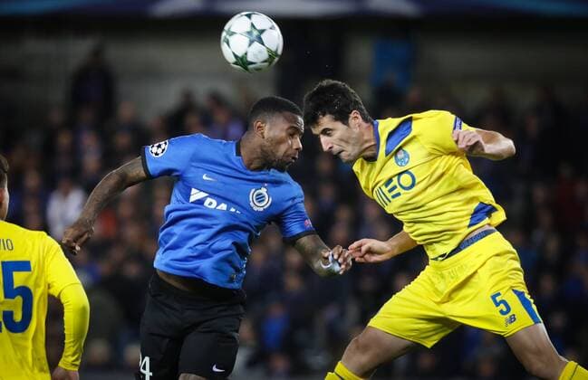 Club s Stefano Denswil and Porto s defender Ivan Marcano fight for the ball during the third game of the group stage of the UEFA Champions League competition between Belgian first division soccer team Club Brugge KV and Portugese club FC Porto in Brugge, Tuesday 18 October 2016. VIRGINIExLEFOUR  x04959703x