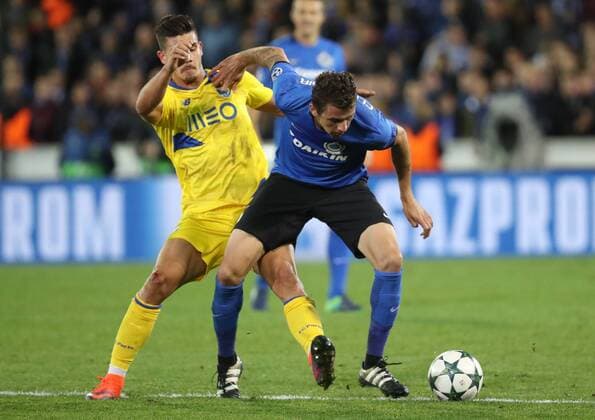 Porto s forward Andre Silva and Club s Claudemir Domingues De Souza fight for the ball during the third game of the group stage of the UEFA Champions League competition between Belgian first division soccer team Club Brugge KV and Portugese club FC Porto in Brugge, Tuesday 18 October 2016. VIRGINIExLEFOUR  x04959959x