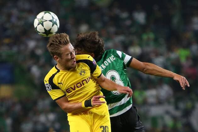 October 18, 2016 - Lisbon, Portugal - Dortmund s defender Felix Passlack heads the ball with Sporting s midfielder Lazar Markovic (R ) during the UEFA Champions League Group F football match Sporting CP vs Borussia Dortmund at the Alvalade stadium in Lisbon, Portugal on October 18, 2016. Sporting Clube de Portugal v Borussia Dortmund - UEFA Champions League  - ZUMAn230 20161018_zaa_n230_161