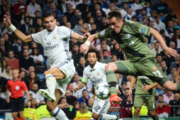 Real Madrid vs Legia Warsaw Champions League Group F match Real Madrid vs Legia Warsaw at the Santiago Bernabeu on 18 October, 2016 in Madrid, Spain. In the picture: Pepe (Real), Marcelo (Real), Miroslav Radovic (Legia)  EN_01229194_0086