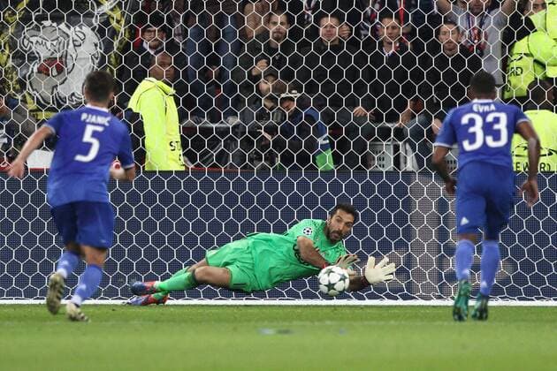 October 18, 2016 - Lyon, France - Juventus goalkeeper Gianluigi Buffon (1) dives for the ball saving the penalty kick during the Uefa Champions League group stage football match n3 LYON - JUVENTUS on 18 10 2016 at the Parc Olympique Lyonnais in Lyon, France. Olympique Lyonnais v Juventus - UEFA Champions League  - ZUMAn230 20161018_zaa_n230_115