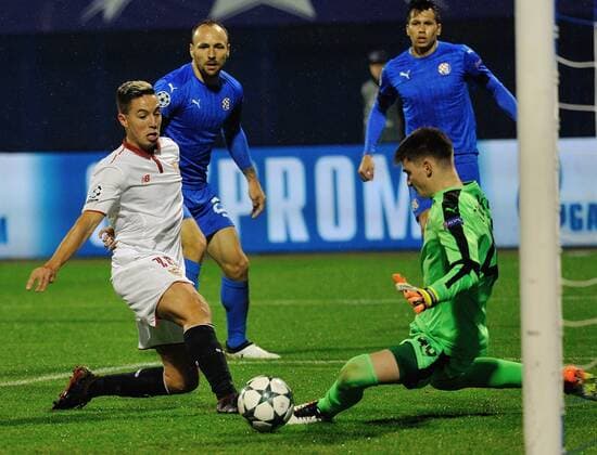 ZAGREB, Oct. 18, 2016 -- Samir Nasri of Sevilla FC (1st, L) shoots the ball during the UEFA Champions League Group H match against Dinamo Zagreb at the Maksimir Stadium in Zagreb, Croatia, Oct. 18, 2016. Sevilla FC won 1-0. ) (SP)CROATIA-ZAGREB-UEFA CHAMPIONS LEAGUE MisoxLisanin 