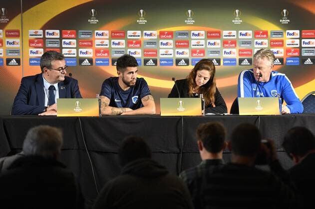 Genk s press officer Rudi Pascal, Genk s Alejandro Pozuelo, the Dutch-Spanish translator and Genk s head coach Peter Maes pictured during a press conference PK Pressekonferenz of Belgian soccer team RC Genk, Wednesday 19 October 2016, in Genk. Tomorrow Genk is playing the third game of the group stage of the Europa League competition against Portuguese team Athletic Bilbao. YORICKxJANSENS  x04960373x