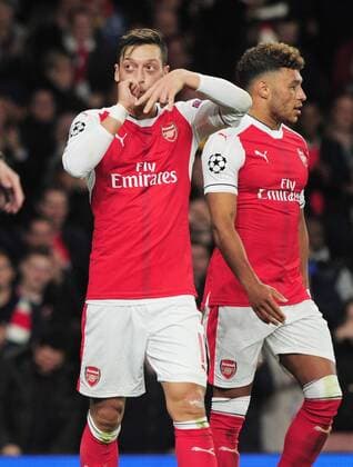 Football - 2016 2016 Champions League - Arsenal vs. PFC Ludogorets Razgrad Mesut Ozil of Arsenal celebrates the first goal of his hat trick at The Emirates. COLORSPORT ANDREW COWIE 