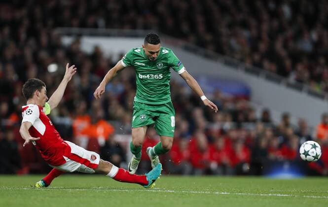 (161020) -- LONDON, Oct. 20, 2016 -- Laurent Koscielny (L) of Arsenal vies with Marcelinho of Ludogorets Razgrad during the UEFA Champions League Group A match between Arsenal and Ludogorets Razgrad at the Emirates Stadium in London, Britain on Oct. 19, 2016. Arsenal won 6-0. ) (SP)BRITAIN-LONDON-FOOTBALL-UEFA CHAMPIONS LEAGUE-ARSENAL VS LUDOGORETS RAZGRAD HanxYan 