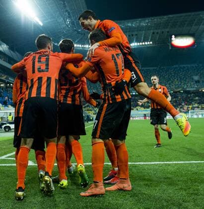 Shakhtar Donetsk s players celebrate after scoring during a third game of the group stage (group H) of the Europa League competition between Ukraine club Shaktar Donetsk and Belgian soccer team KAA Gent, Thursday 20 October 2016, in Lviv, Ukraine. JASPERxJACOBS  x04962467x
