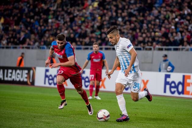 UEFA Europa League 2016-2017, Group L game between FC Steaua Bucharest ROU and FC Zurich (SUI) October 2016 October 20, 2016: Ovidiu Popescu 23 of FC Steaua Bucharest and Roberto Rodriguez 34 of FC Zurich in action during the UEFA Europa League 2016-2017, Group L game between FC Steaua Bucharest ROU and FC Zurich (SUI) at National Arena, Bucharest, Romania ROU. Foto: