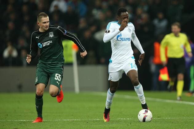 KRASNODAR, RUSSIA - OCTOBER 20, 2016: FC Krasnodar s Artur Jedrzejczyk (L) and FC Schalke 04 s Abdul Baba Rahman fight for the ball in their 2016 17 Season UEFA Europa League Group I Round 3 football match at Krasnodar Stadium. FC Schalke 04 won the game 1-0. Vitaly Timkiv TASS  TS0350E0