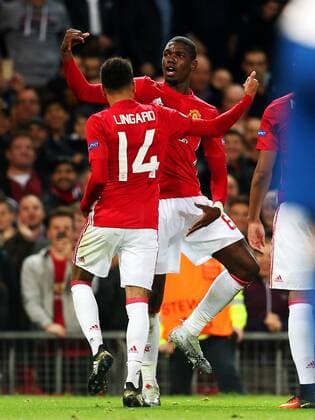 Paul Pogba of Manchester United ManU celebrates with Jesse Lingard during the UEFA Europa League match at Old Trafford, Manchester. Picture date: October 20th, 2016. Pic Matt McNulty Sportimage EDITORIAL USE ONLY. No use with unauthorised audio, video, data, fixture lists, club league logos or live services. Online in-match use limited to 120 images, no video emulation. No use in betting, games or single club league player publications.