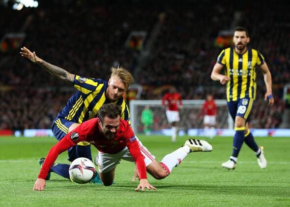 Simon Kjaer of Fenerbahce brings down Juan Mata of Manchester United ManU for a penalty during the UEFA Europa League match at Old Trafford, Manchester. Picture date: October 20th, 2016. Pic Matt McNulty Sportimage EDITORIAL USE ONLY. No use with unauthorised audio, video, data, fixture lists, club league logos or live services. Online in-match use limited to 120 images, no video emulation. No use in betting, games or single club league player publications.