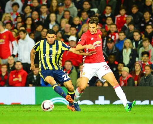 UEFA Europa League Group A day 3 match between Manchester United ManU and Fenerbahce at Old Trafford Stadium in Manchester , England , October 20 , 2016. Final Score: Manchester United 4 - Fenerbhace 1 Pictured: Ismail Koybasi of Fenerbahce and Matteo Darmain (R) of Manchester United. 